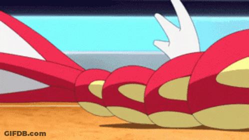 A Cartoon Character Is Laying On The Ground GIF