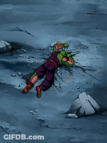 A Cartoon Character Is Laying On The Ground With A Cracked Wall Behind Him GIF