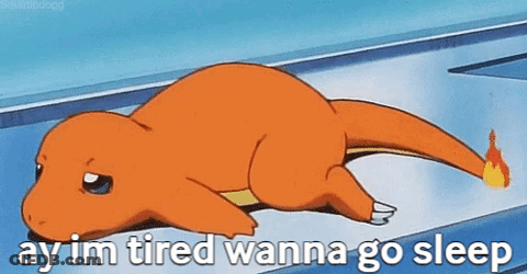A Cartoon Character Is Laying On The Ground With The Words `` Ay Im Tired Wanna Go Sleep '' Written On It . GIF