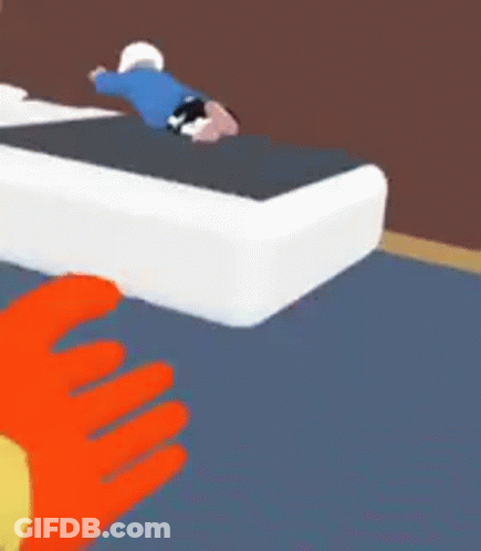 A Cartoon Character Is Laying On Top Of A Bed In A Room . GIF