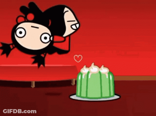 A Cartoon Character Is Looking At A Cake With A Heart On It GIF