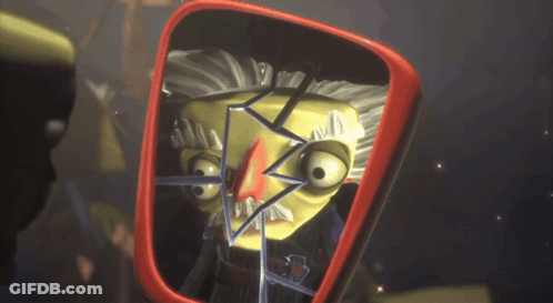 A Cartoon Character Is Looking At Himself In A Red Mirror GIF