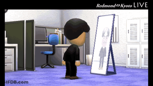 A Cartoon Character Is Looking At His Reflection In A Mirror With The Words Redmond Kyoto Live Above Him GIF