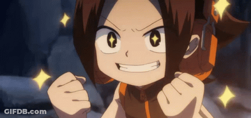 A Cartoon Character Is Making A Funny Face With Her Fist In The Air . GIF