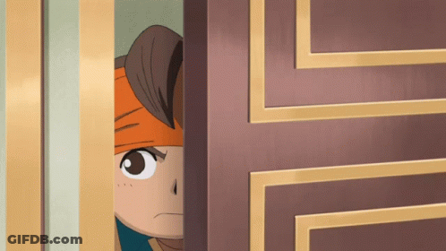 A Cartoon Character Is Peeking Through A Door GIF
