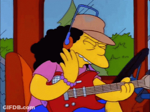 A Cartoon Character Is Playing A Guitar And Wearing Headphones . GIF