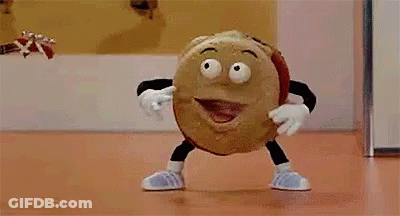 A Cartoon Character Is Playing A Guitar While Standing On A Table . GIF