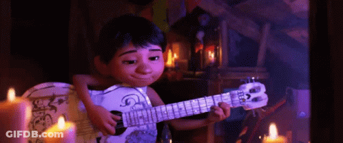 A Cartoon Character Is Playing A Guitar With The Letter B On The Headstock GIF