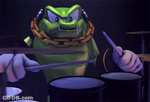 A Cartoon Character Is Playing The Drums With A Chain Around Its Neck GIF