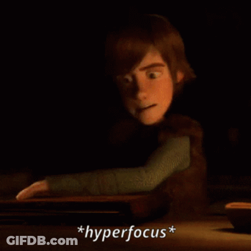A Cartoon Character Is Reading A Book And The Word Hyperfocus Is Below Him GIF