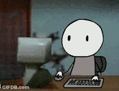 A Cartoon Character Is Sitting At A Desk Using A Keyboard And Mouse GIF