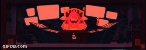 A Cartoon Character Is Sitting At A Desk With A Crown On It . GIF