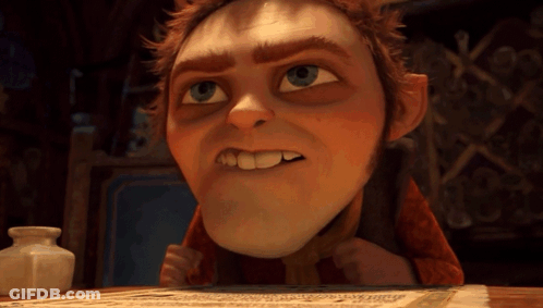 A Cartoon Character Is Sitting At A Table With A Piece Of Paper GIF