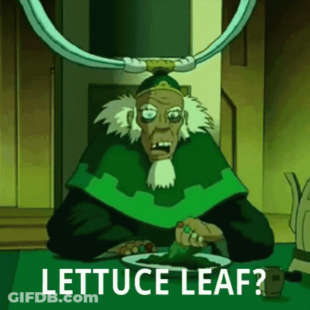 A Cartoon Character Is Sitting At A Table With A Plate Of Lettuce And The Words `` Lettuce Leaf '' . GIF