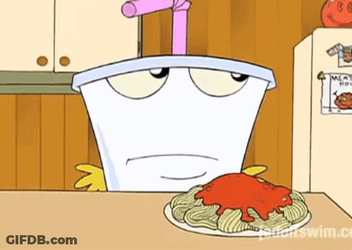 Cartoon Character Sitting At Table With Spaghetti GIF