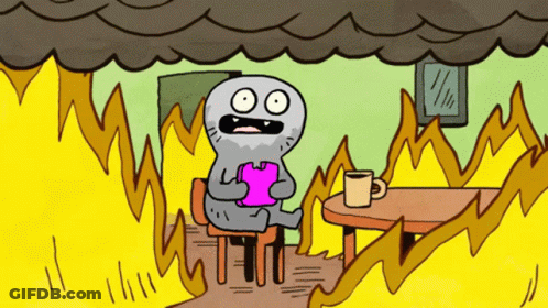 A Cartoon Character Is Sitting At A Table With Flames Coming Out Of It GIF