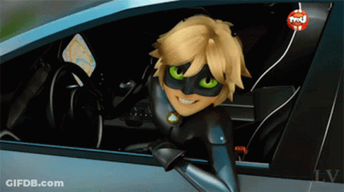 A Cartoon Character Is Sitting In A Car With A Tnt Logo On The Bottom Right GIF
