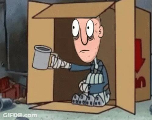 A Cartoon Character Is Sitting In A Cardboard Box Holding A Cup GIF
