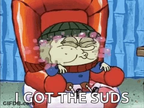 A Cartoon Character Is Sitting In A Chair And Saying I Got The Suds GIF