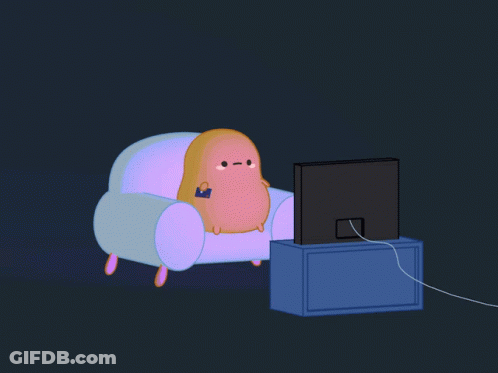 A Cartoon Character Is Sitting In A Chair Watching A Tv GIF