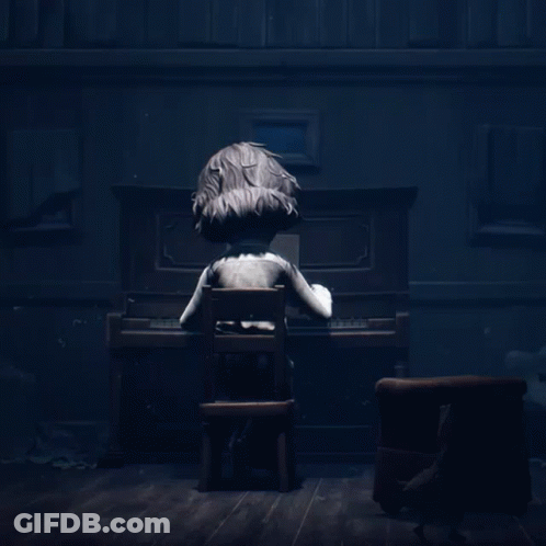 A Cartoon Character Is Sitting In Front Of A Piano In A Dark Room GIF
