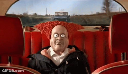 A Cartoon Character Is Sitting In The Back Of A Car GIF