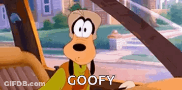 A Cartoon Character Is Sitting In The Driver 'S Seat Of A Car And Says `` Goofy '' . GIF