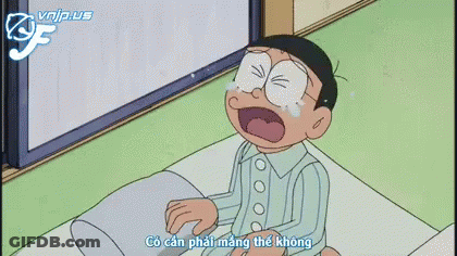 A Cartoon Character Is Sitting On A Bed With A Pillow And Says Minh Moi Ve Khuya Mot Chut Thoi Ma GIF