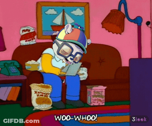 A Cartoon Character Is Sitting On A Couch With A Bag Of Popcorn And The Words Woo-Whoo On The Bottom GIF