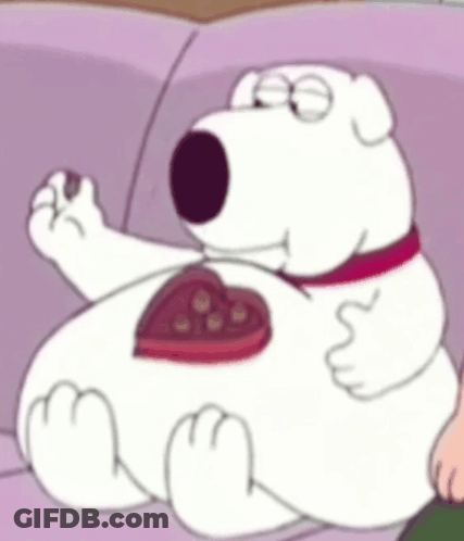 Cartoon Character Sitting On Couch With Heart Chocolates GIF
