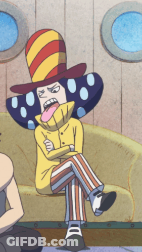 A Cartoon Character Is Sitting On A Couch With His Tongue Sticking Out GIF