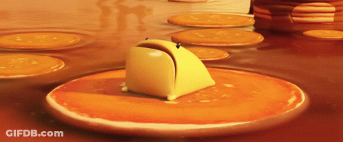 A Cartoon Character Is Sitting On A Pancake GIF