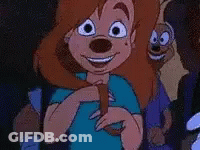 A Cartoon Character Is Smiling And Holding A Dog In Her Hand . GIF