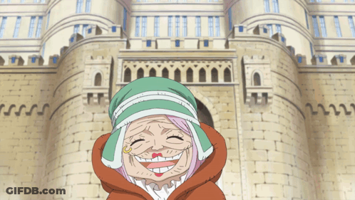 A Cartoon Character Is Smiling In Front Of A Large Brick Building GIF