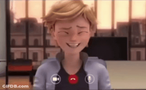 A Cartoon Character Is Smiling While Talking On A Video Call With A Camera . GIF