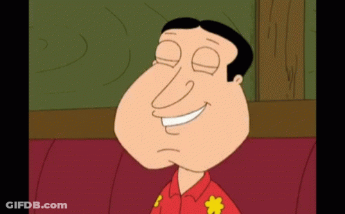 A Cartoon Character Is Smiling With His Eyes Closed And Wearing A Red Shirt With Flowers On It GIF