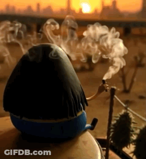 A Cartoon Character Is Smoking A Cigarette While Sitting On A Table . GIF