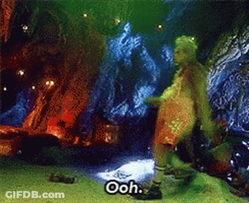 A Cartoon Character Is Standing In A Cave And Says " Ooh " GIF