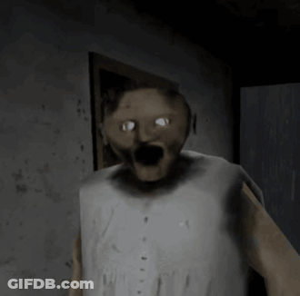 A Cartoon Character Is Standing In A Dark Room With His Eyes Glowing . GIF