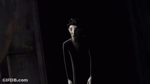 A Cartoon Character Is Standing In A Dark Room . GIF