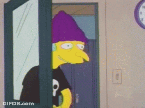 A Cartoon Character Is Standing In A Doorway Wearing A Purple Hat And Headphones . GIF