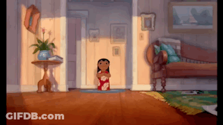 A Cartoon Character Is Standing In A Living Room With A Couch GIF