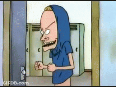 A Cartoon Character Is Standing In A Locker Room Wearing A Blue Shirt And A Hood . GIF