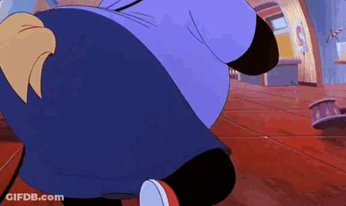 A Cartoon Character Is Standing In A Room With A Purple Shirt On . GIF
