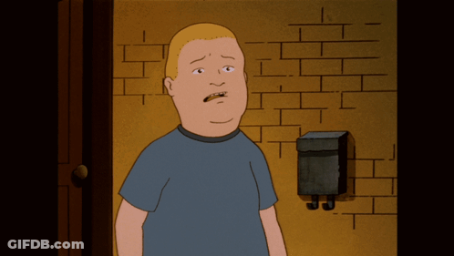 A Cartoon Character Is Standing In Front Of A Brick Wall And A Mailbox GIF