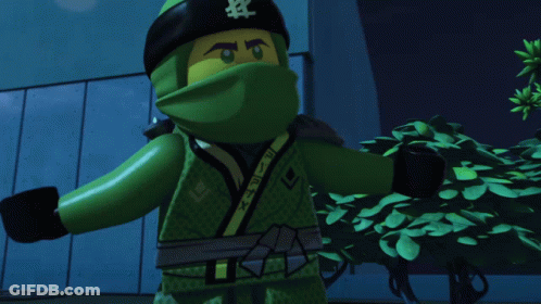 A Cartoon Character Is Standing In Front Of A Building With A Green Light Coming Out Of His Head GIF