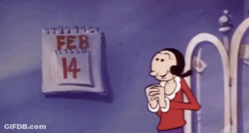 A Cartoon Character Is Standing In Front Of A Calendar That Says February 14 On It . GIF