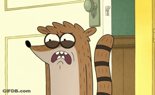 A Cartoon Character Is Standing In Front Of A Door With A Key On It GIF