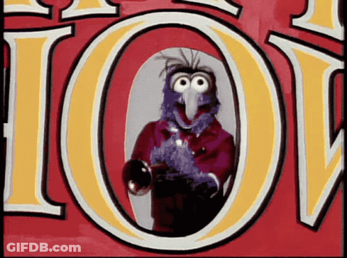 A Cartoon Character Is Standing In Front Of A Sign That Says Joy GIF
