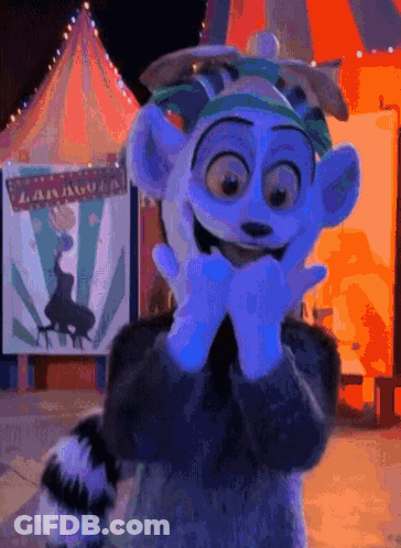 A Cartoon Character Is Standing In Front Of A Sign That Says ' Madagascar ' GIF